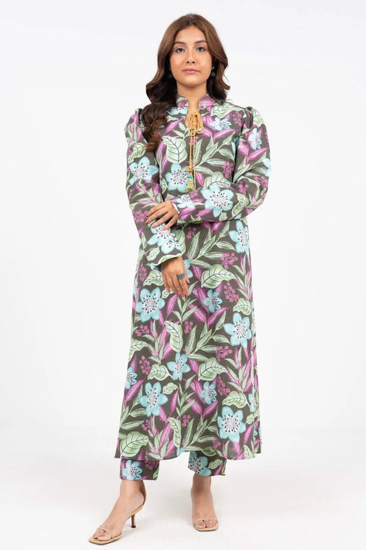Woman wearing a floral outfit on a white background