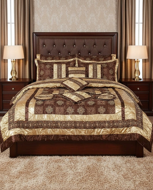 Luxurious bedroom with a brown and beige patterned comforter set on a bed.