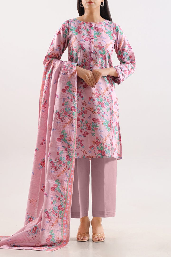 Woman wearing a pink floral outfit with a matching dupatta on a white background
