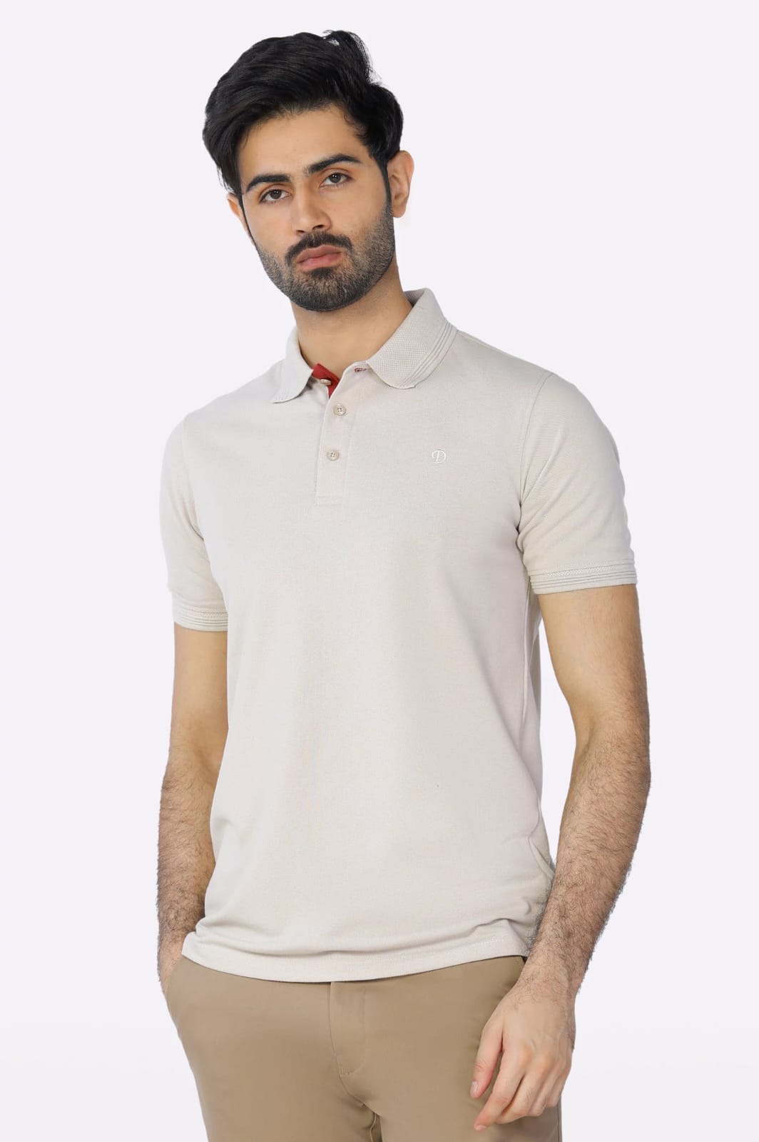 A man wearing a white Diners brand jacquard collar polo t-shirt with a three-button placket and a subtle logo on the chest.