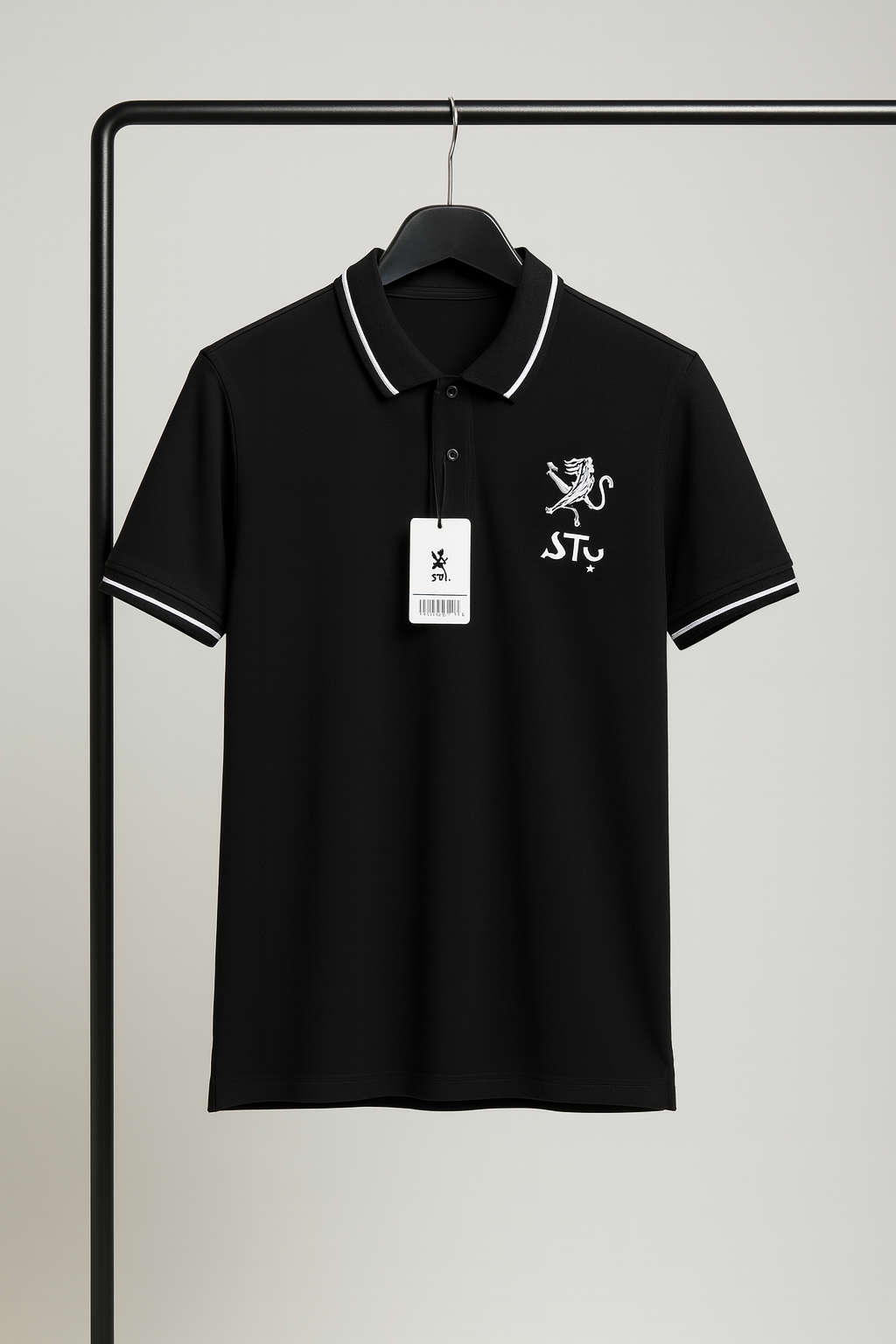 Black polo shirt with white trim and logo on a hanger against a gray background