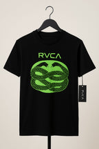 Black t-shirt with green RVCA logo on a hanger against a beige background