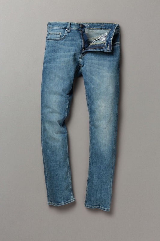 Blue jeans on a gray background