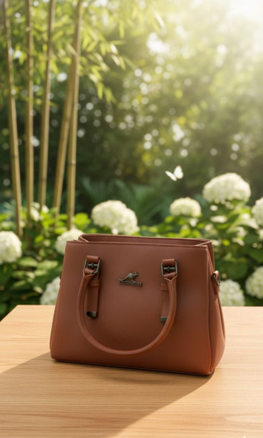 Brown handbag on a wooden surface with a blurred natural background