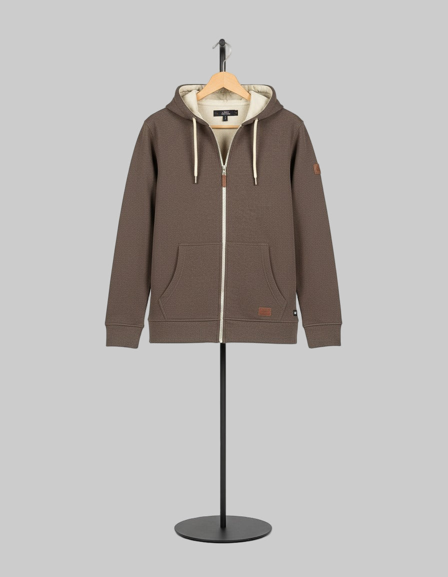 Brown hoodie on a mannequin against a gray background