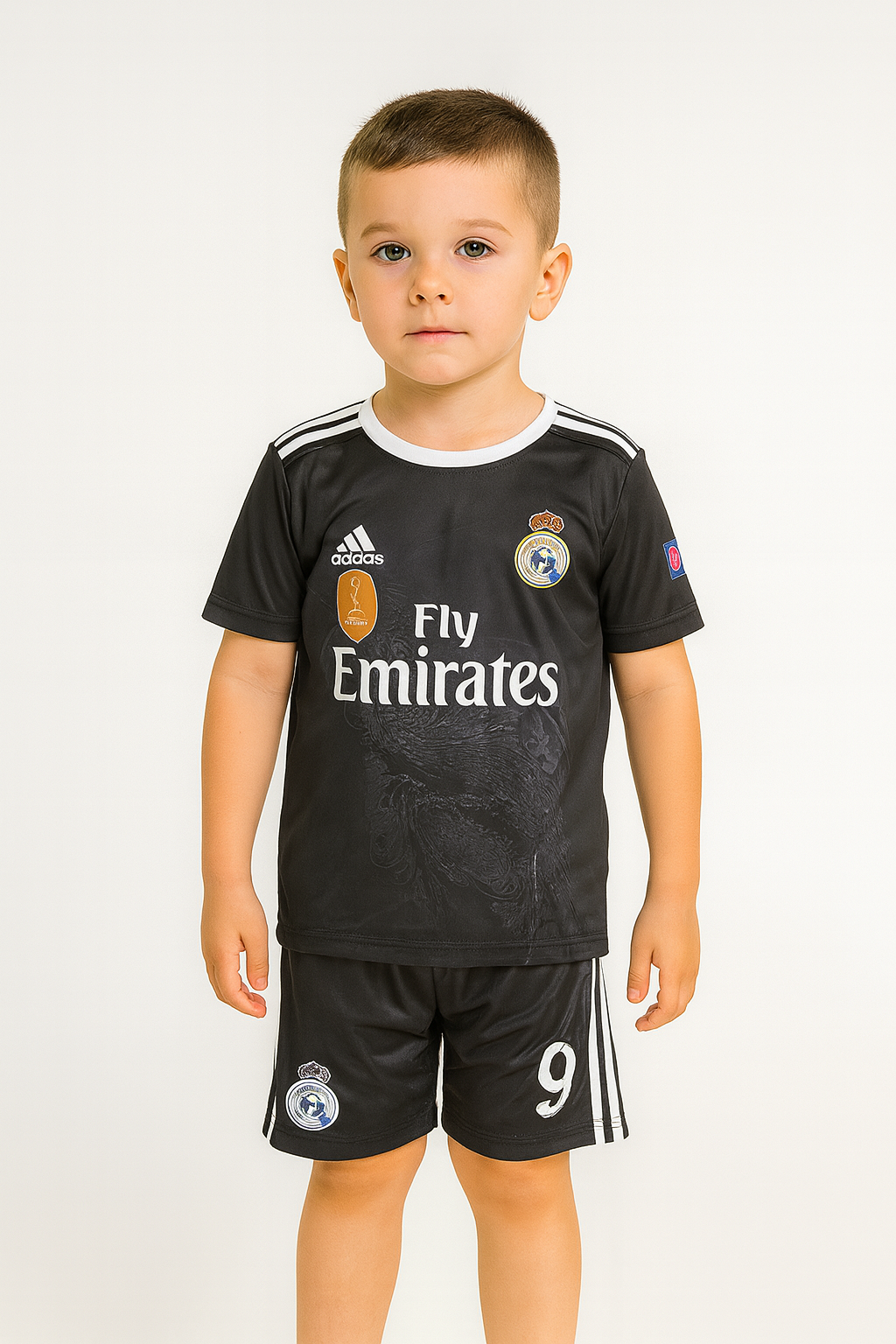 Child wearing a black sports jersey with visible branding on a white background