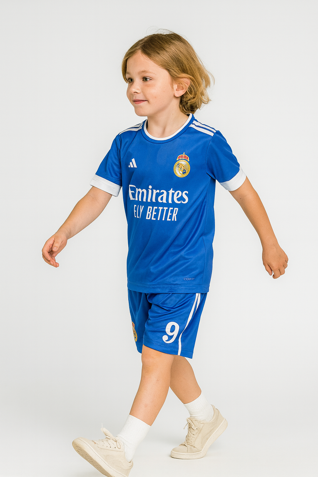 Child wearing a blue sports jersey with visible branding on a white background