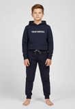 Child wearing a navy hoodie and jogger set with 'True Indigo' branding on a white background