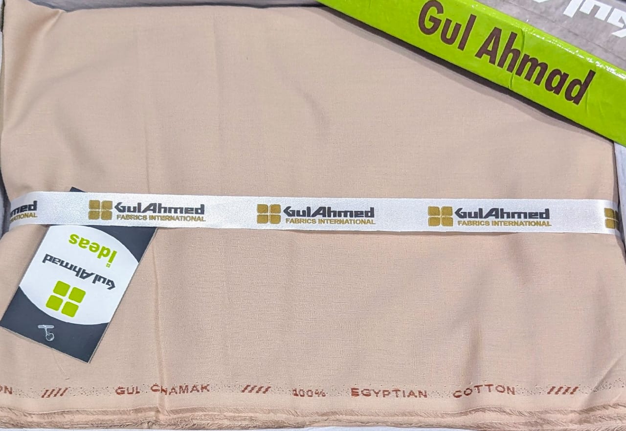 Fabric with Gul Ahmed branding and text on a beige background