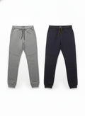 Gray and black jogger pants on a white background