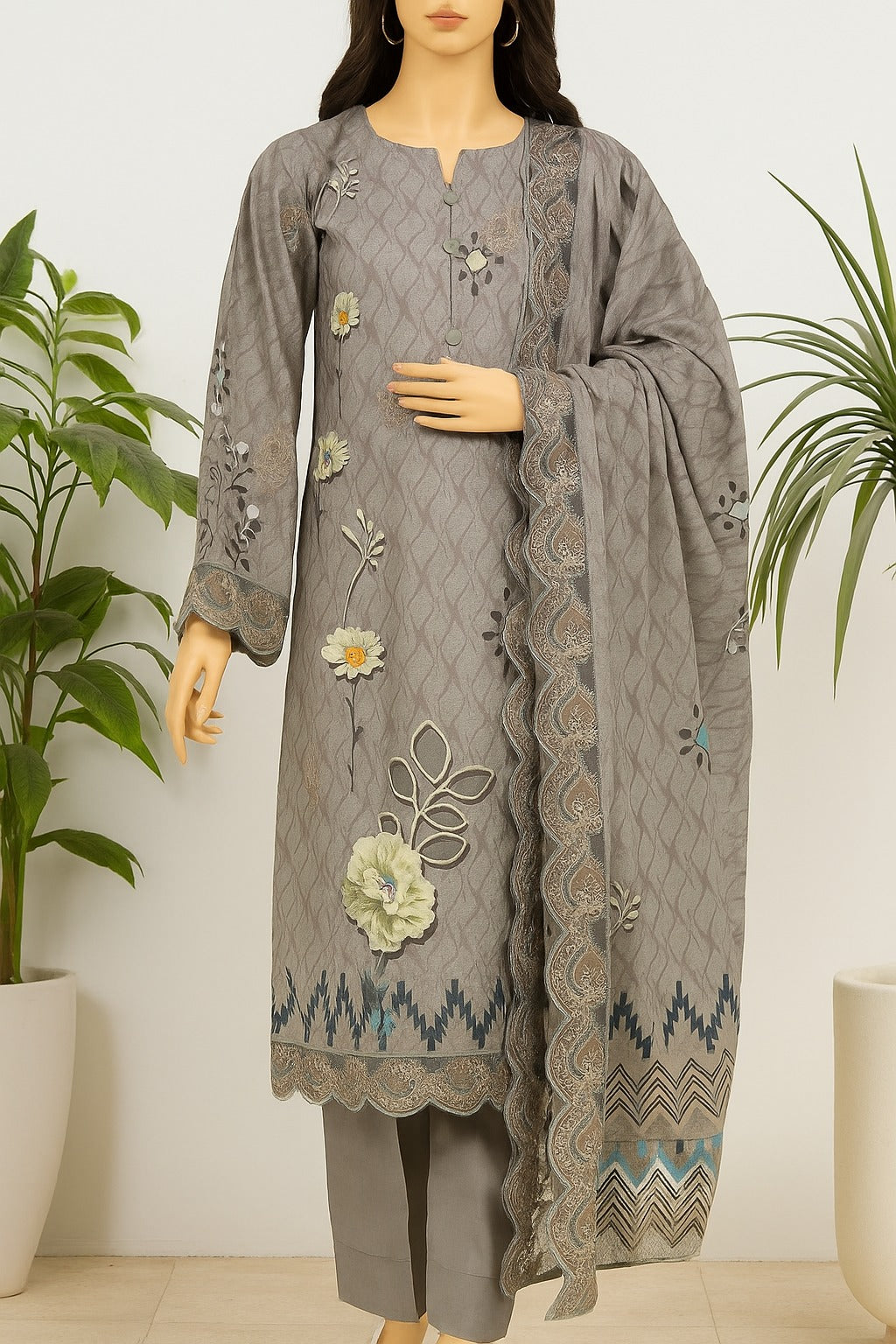 Gray embroidered outfit with a matching dupatta on a mannequin against a white background.