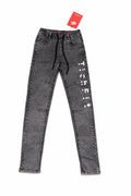 Gray jeans with white text on a white background