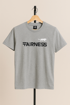 Gray t-shirt with 'AIRNESS' text on a hanger against a beige background