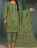 Green embroidered traditional outfit with dupatta on a gray background