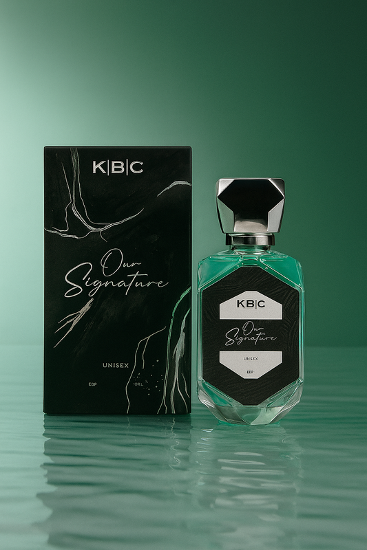 KBC perfume bottle and packaging on a green background