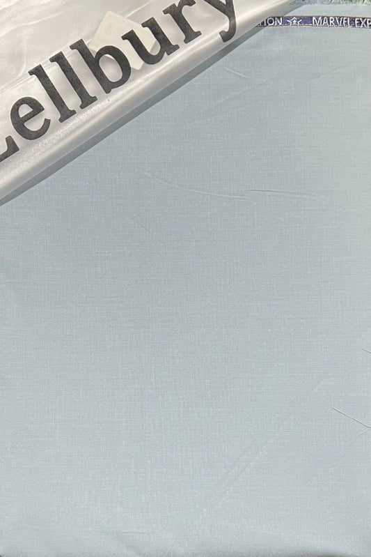 Light blue mattress with 'Wellbury' branding on a white background