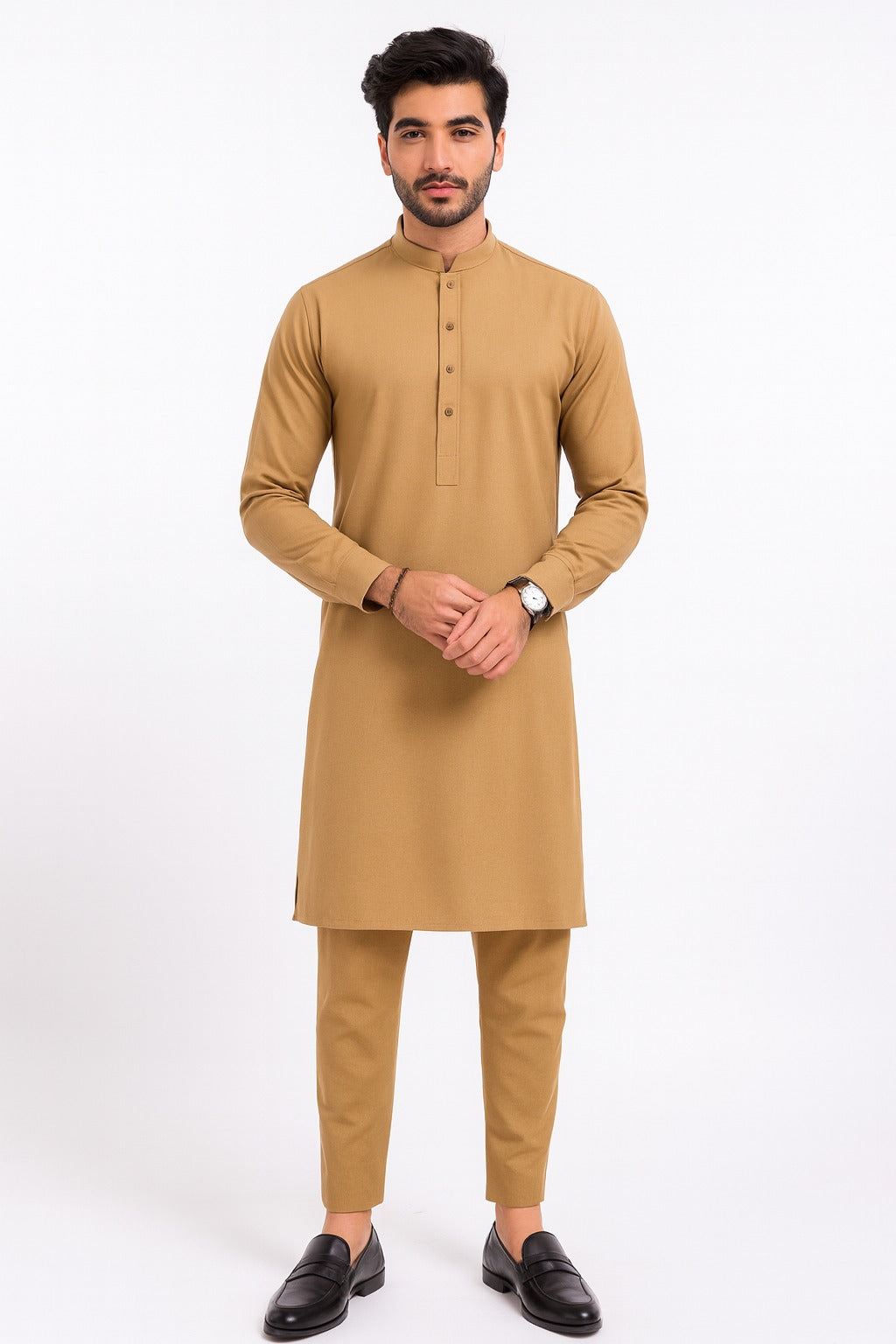 Man wearing a beige kurta with trouser unstitched suit on a white background