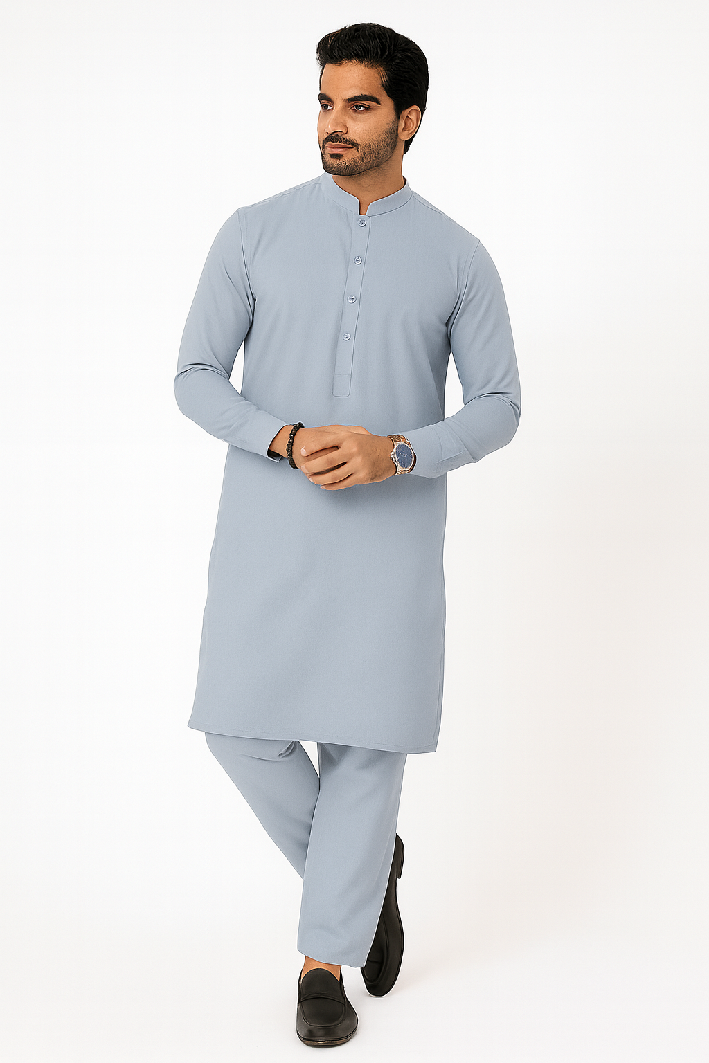 Man wearing a light gray kurta with trouser on a white background