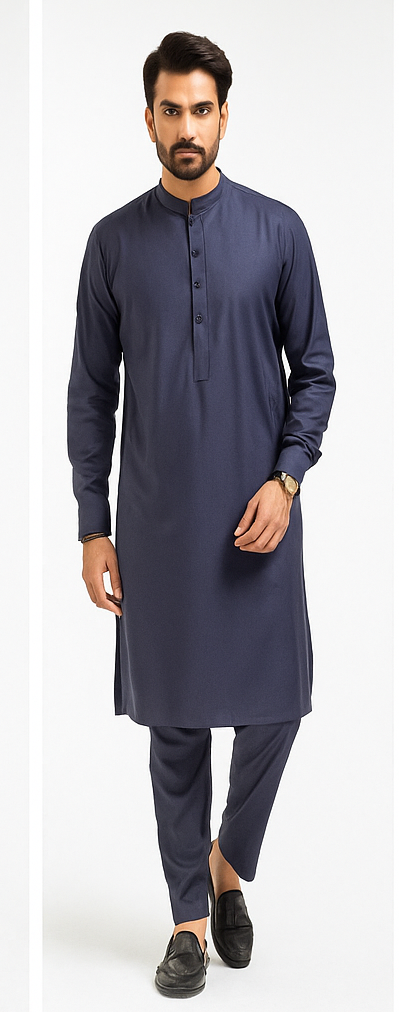 Man wearing a navy kurta with trouser on a white background