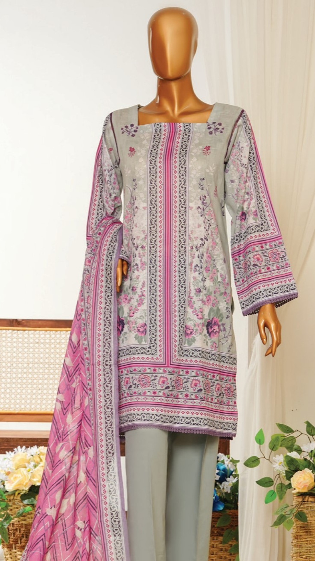 Mannequin MTJ wearing a light gray and pink printed outfit with a matching dupatta on a white background.