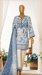 Mannequin wearing a blue and white patterned dress with a matching dupatta, surrounded by decorative elements.