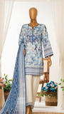 Mannequin wearing a blue and white patterned dress with a matching dupatta, surrounded by decorative elements.