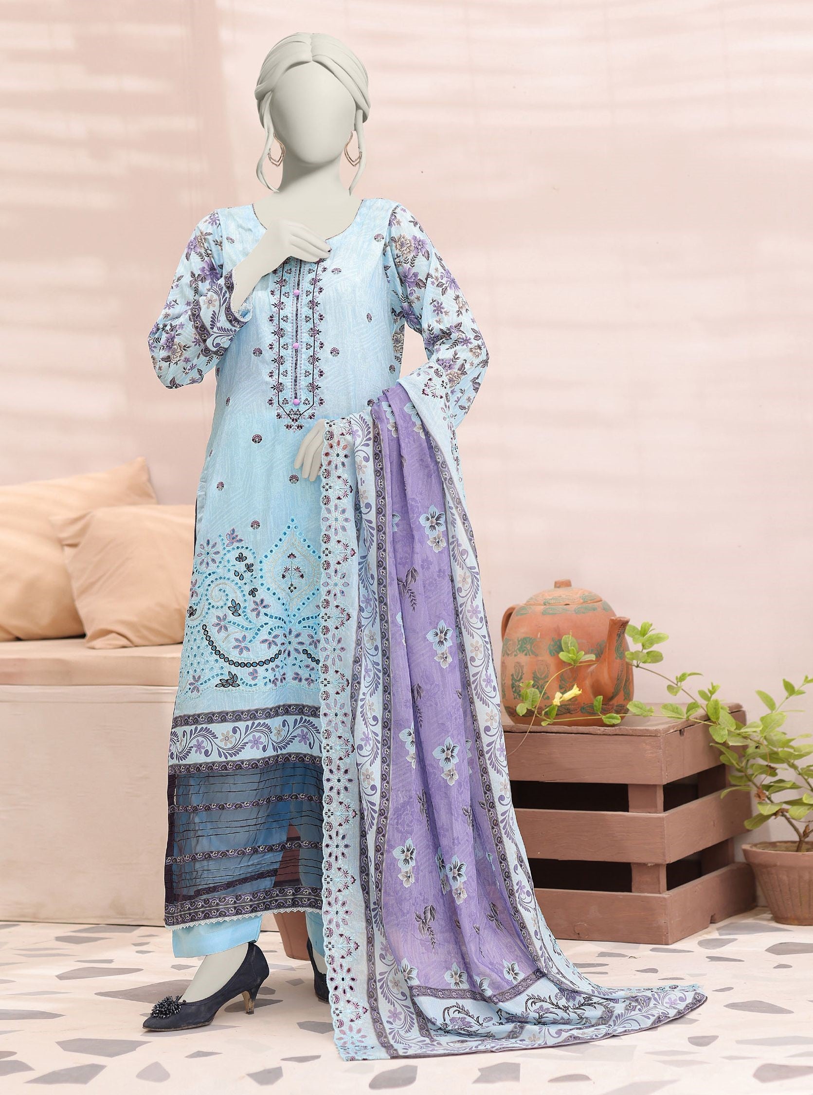 Mannequin wearing a light blue embroidered dress with a matching dupatta on a neutral background