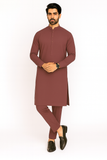 Man wearing a brown kurta with trouser on a white background