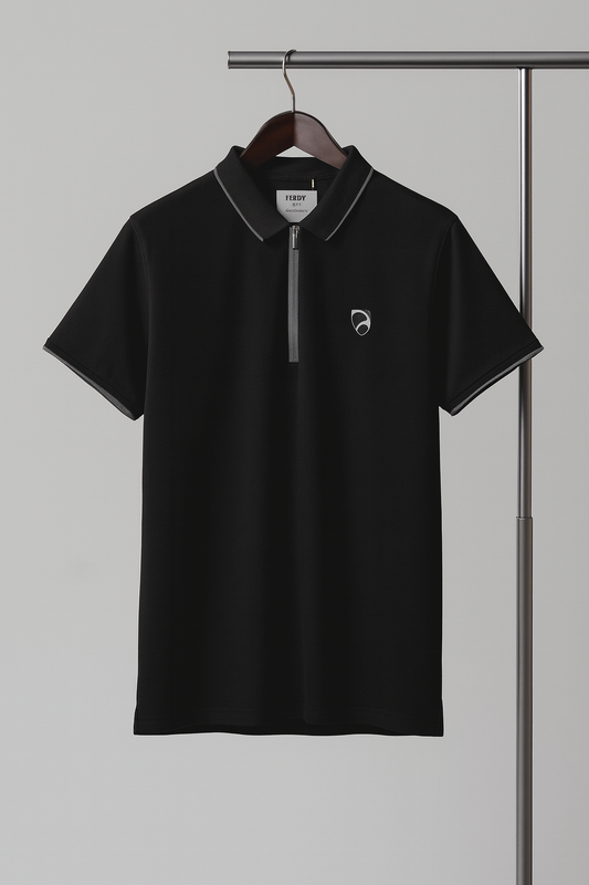 Black polo shirt with a small logo on a hanger against a gray background
