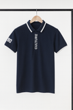 Navy blue polo shirt with white text on a hanger against a white background