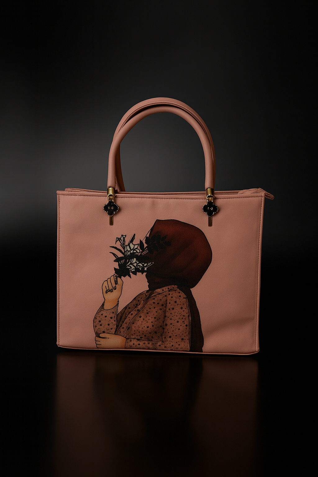 Pink handbag with a printed design of a person holding a plant on a black background