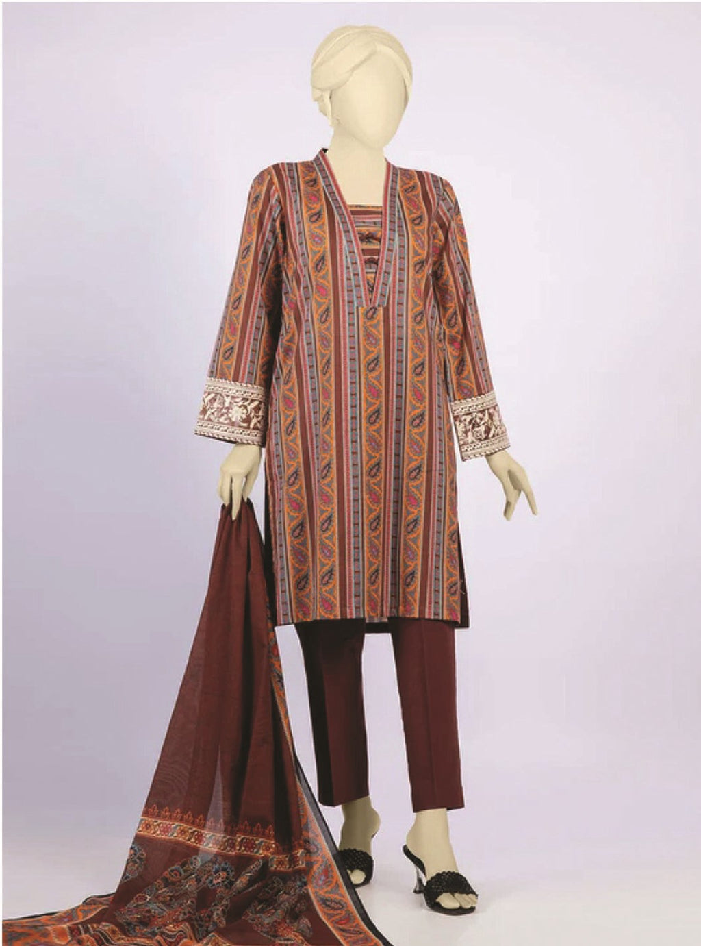 Traditional outfit with a patterned top, pants, and dupatta on a mannequin against a white background