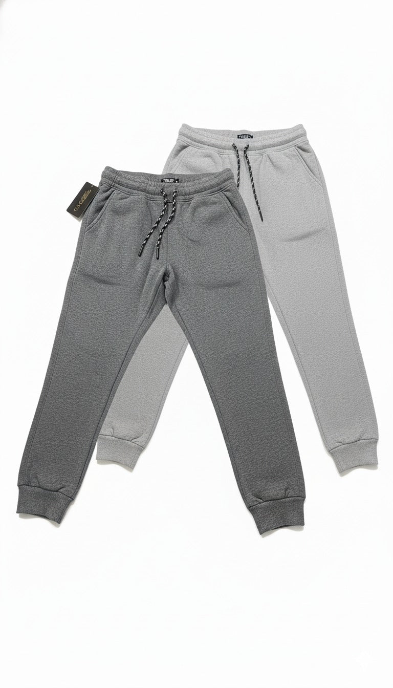 Two pairs of gray sweatpants on a white background