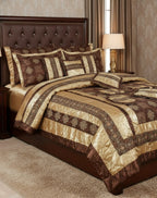 Brown and gold patterned comforter set on a bed in a bedroom.