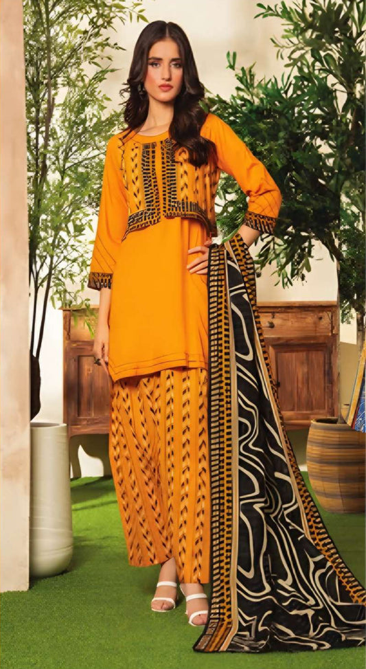 Woman in a bright orange traditional outfit with black patterns standing outdoors.