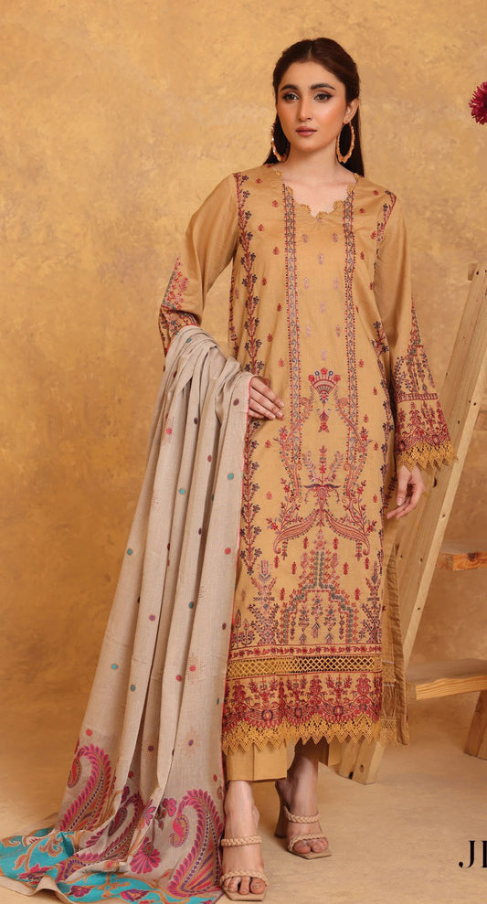 Woman wearing a beige embroidered traditional outfit with a matching dupatta on a beige background