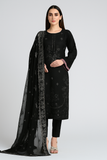 Woman wearing a black embroidered outfit with a matching dupatta on a white background