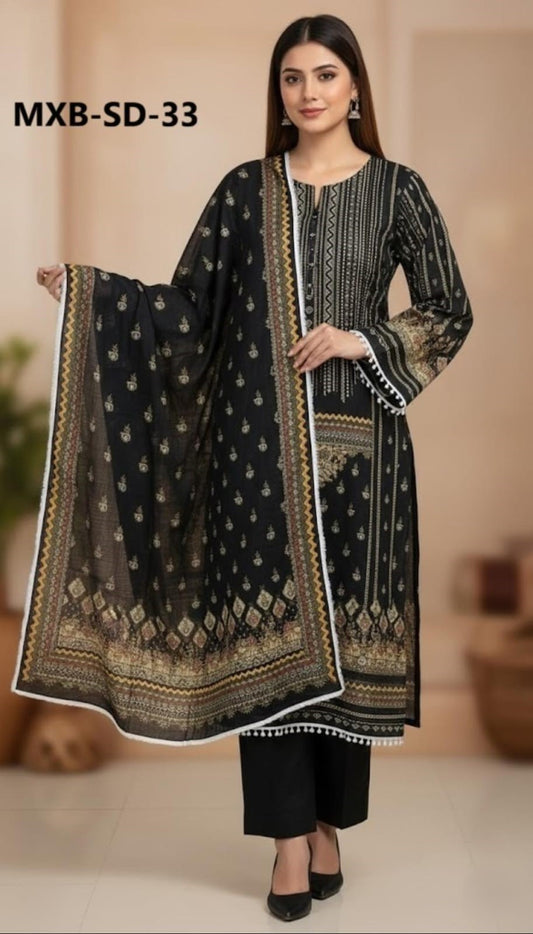 Woman wearing a black embroidered outfit with a matching dupatta on a beige background