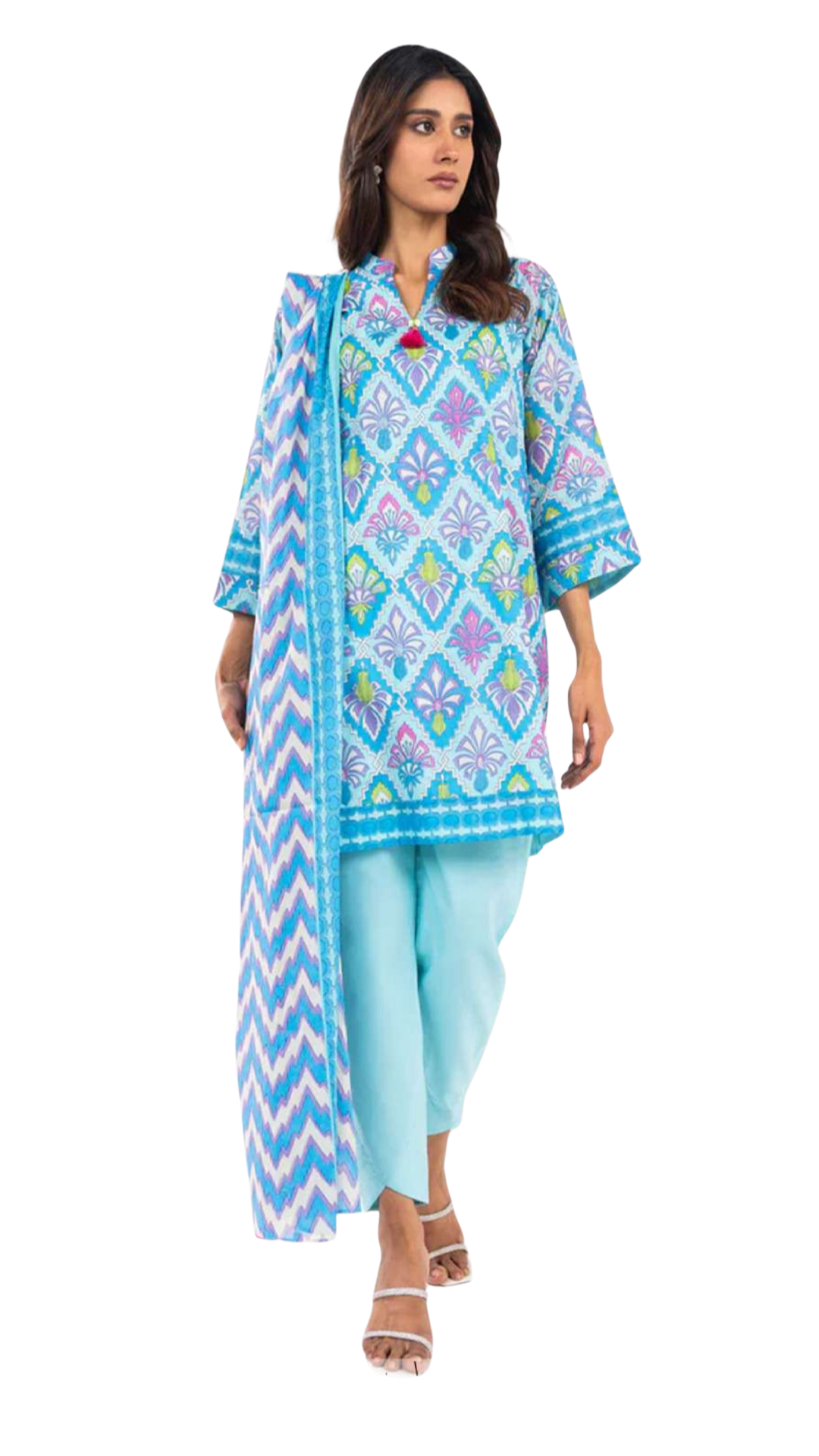 Woman wearing a blue and white patterned kurta with light blue pants on a white background