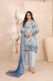 Woman wearing a blue floral dress with matching dupatta in a minimalistic setting
