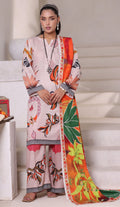 Woman wearing a colorful traditional outfit with a floral design in a minimal indoor setting.