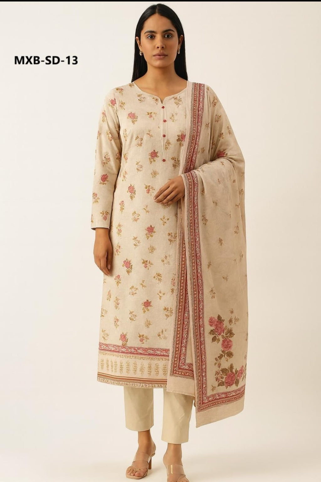 Woman wearing a floral kurta with a matching dupatta on a white background