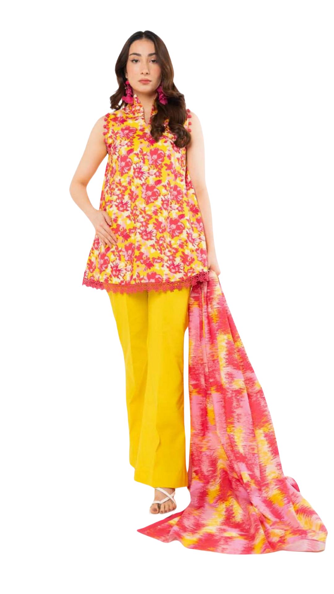 Woman wearing a floral top and yellow trouser with a matching scarf on a white background