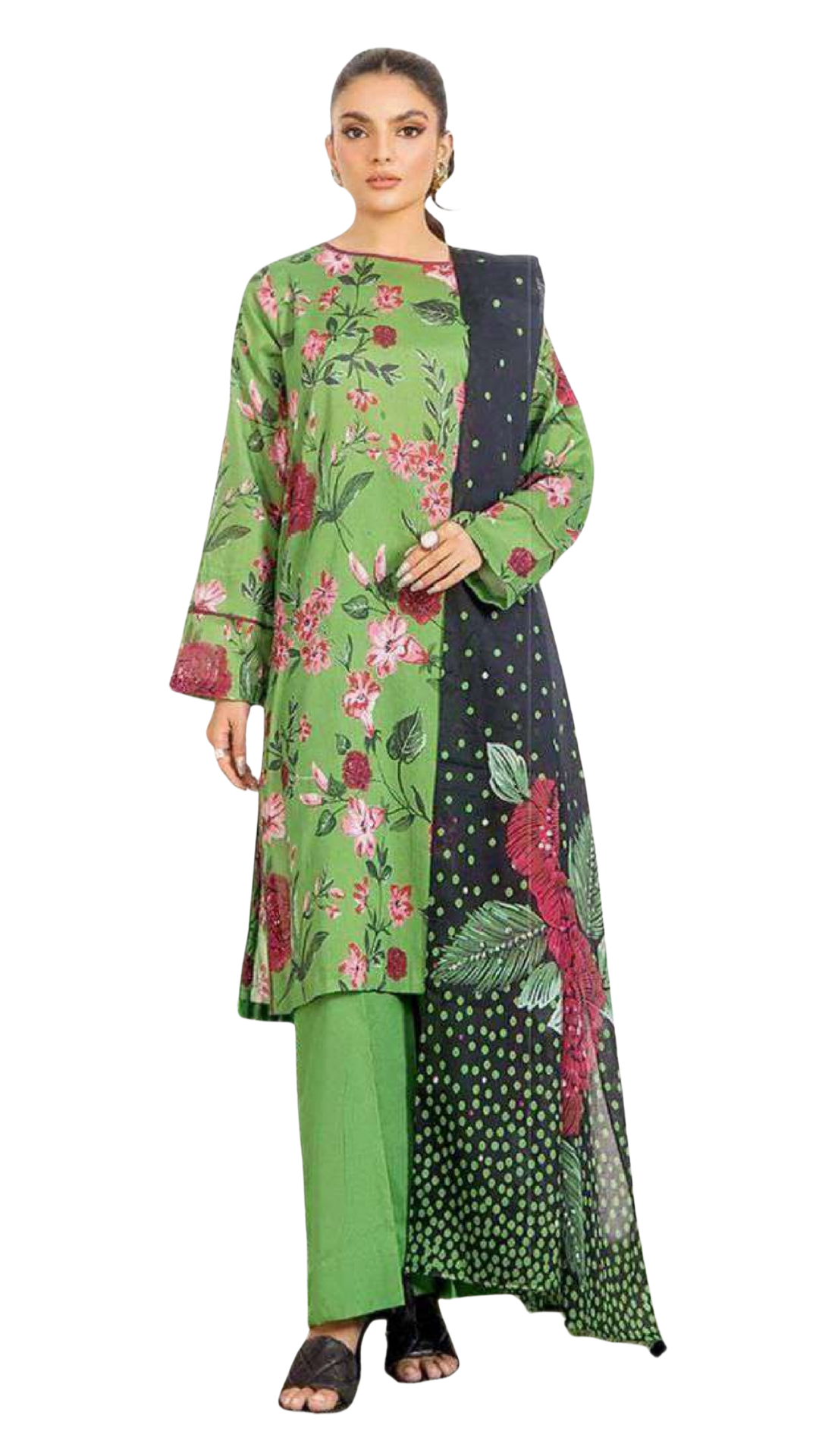 Woman wearing a green floral dress with a black jacket on a white background