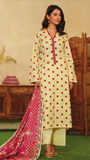 Woman wearing a mor e bagh light yellow kurta with red floral patterns and a pink dupatta in a decorated room.