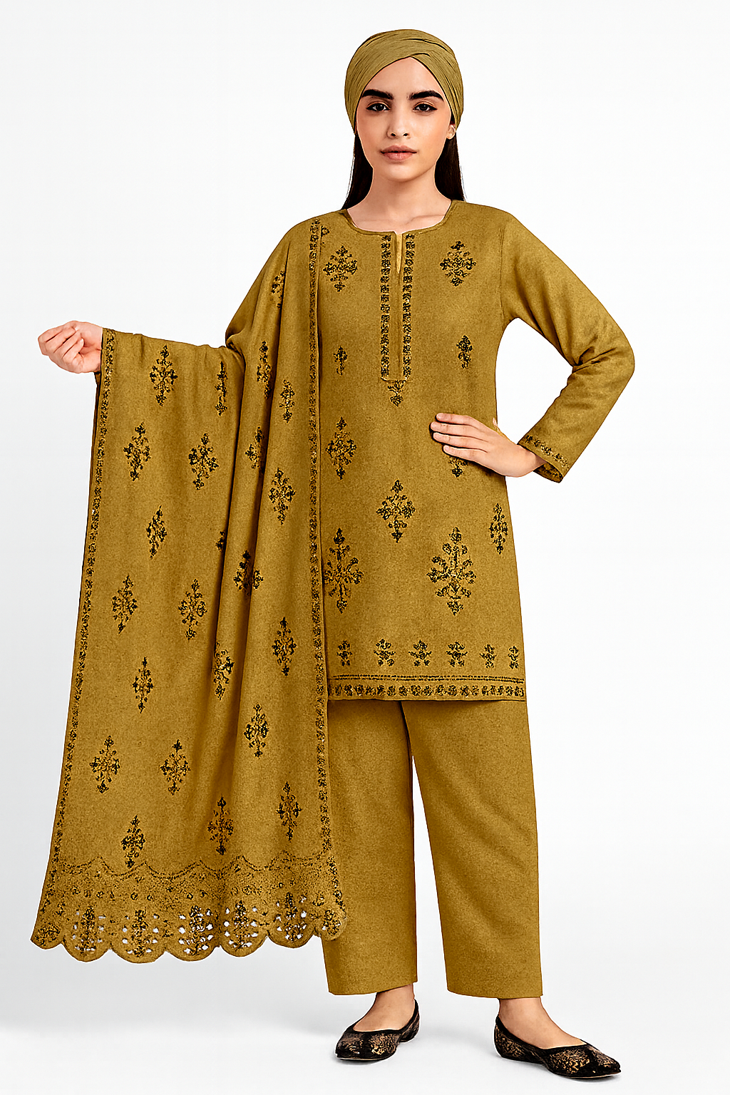 Woman wearing a mustard yellow traditional outfit with an embroidered dupatta on a white background