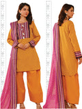 Woman wearing a mustard yellow traditional outfit with pink dupatta on a white background