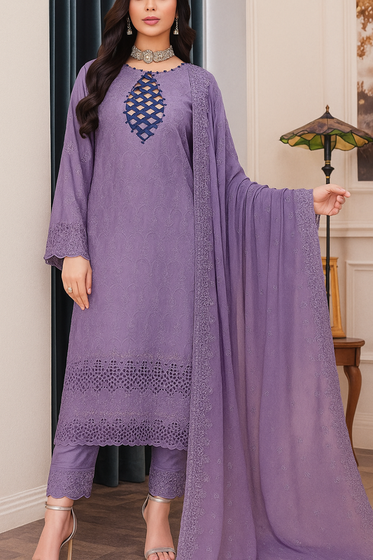 Woman wearing a purple embroidered outfit with a matching dupatta in an indoor setting.