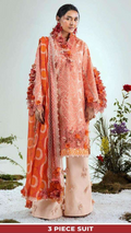 Woman wearing a three-piece suit with floral patterns against a white background