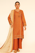 Woman wearing a traditional orange and beige outfit with a matching dupatta on a beige background